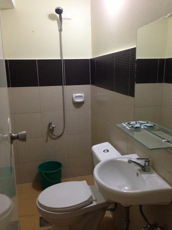 Qm Pension House Тагбиларан Номер фото