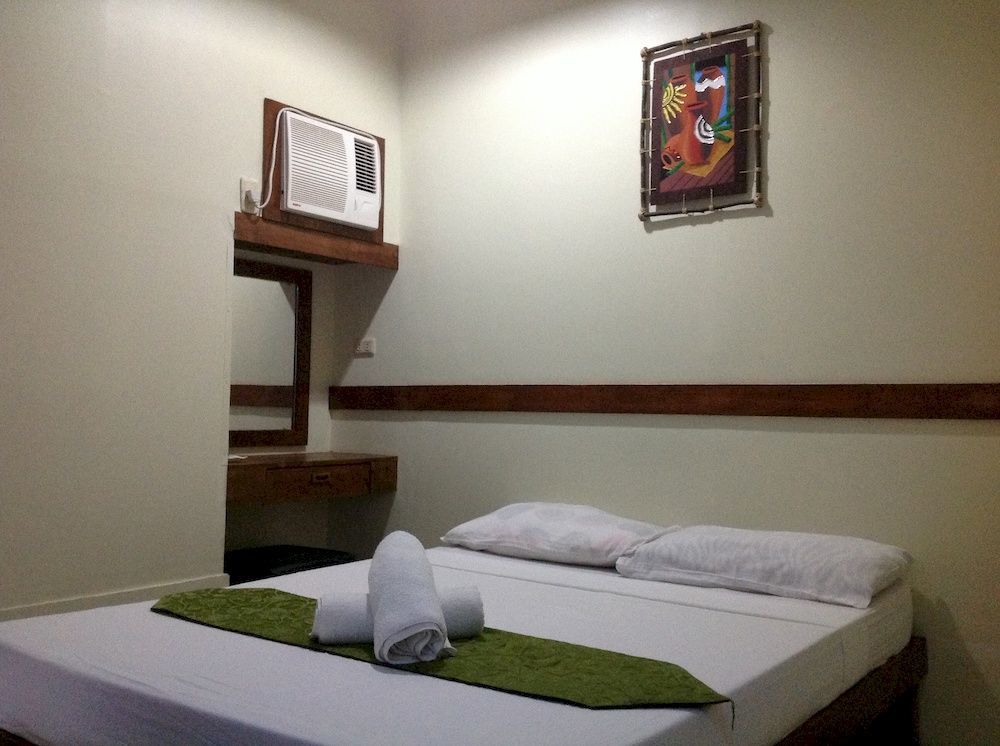 Qm Pension House Тагбиларан Экстерьер фото